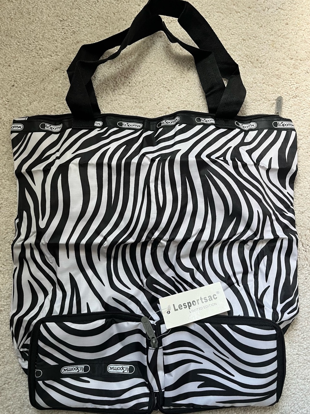 LeSportsac limited edition show case zebra print stripe packable bag